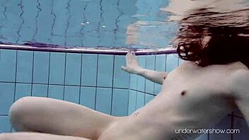 Roxalana Cheh's erotic pool adventure in small tits and bikini