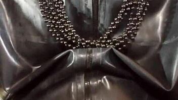 Gay amateur shows off his latex fashion sense