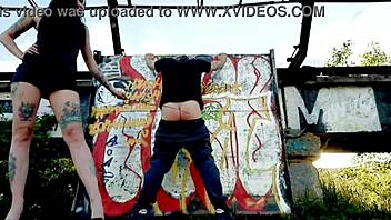 Outdoor humiliation: Dominatrix spanks and punishes bare-assed slave on the street