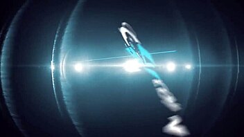 Alison Tyler engages in intense strap-on sex in a red room, showcasing her big tits and ass