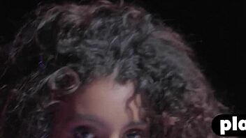 Curly Latina teen Kyrah flaunts her stunning physique in a solo session and poses nude with paint