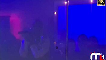 Latina teen dances and strips on balcony at Mc Gw event