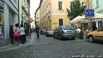 Two friends have a threesome with an elderly blonde woman