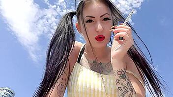 Dominatrix Nika's smoking fetish: Seductive cigarette play and oral sex