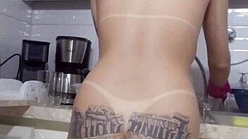 sexy latina teen 18+ washes dishes and prepares dinner