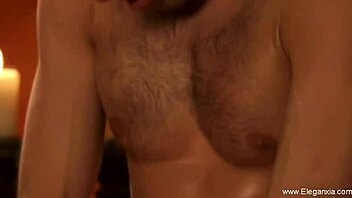 Erotic touches spark desire in this sensual Asian couple's massage.