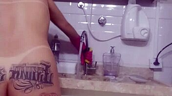 sexy latina teen 18+ washes dishes and prepares dinner