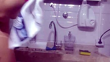 sexy latina teen 18+ washes dishes and prepares dinner