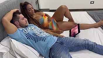 Muscular ebony couple gets horny watching porn
