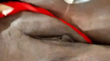 ebony milf in lingerie masturbates with dildo on her shaved pussy