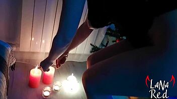 A seductive woman pleasures herself with a large vibrator for an intense climax during the holiday season