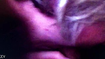 Softcore video of a girl giving a handjob on the couch