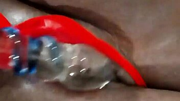 ebony milf in lingerie masturbates with dildo on her shaved pussy