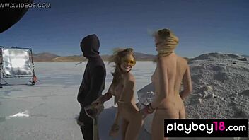 Beautiful women with large breasts ride sand yachts and model in the desert