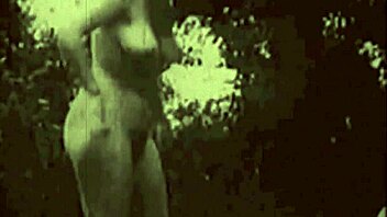 vintage girl explores nature with hairy body and natural tits.