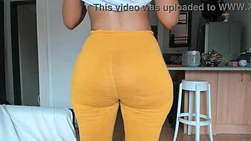 ebony babe teases with booty dance in tight leggings