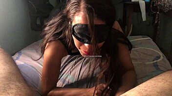 Masked woman performs oral sex on elderly man