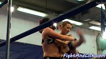 naked lesbians wrestle with big tits in boxing ring