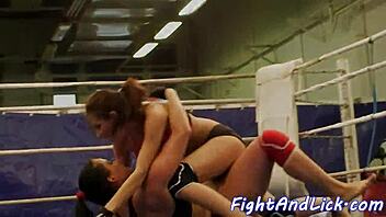 naked lesbians wrestle with big tits in boxing ring