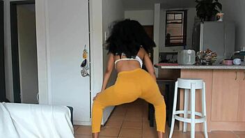 ebony babe teases with booty dance in tight leggings