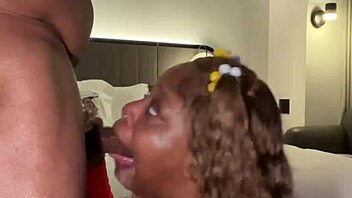 juicy tee, the sexy bbw, gives a messy blowjob to a big black cock.