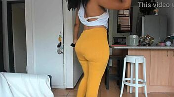ebony babe teases with booty dance in tight leggings