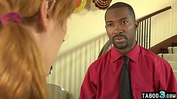 Young redhead Lauren Phillips comforts her black stepfather with a sensual blowjob