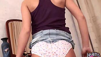 Can you help this teen babe remove her tight skinny jeans and panties?