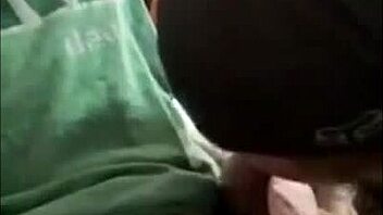 A couple enjoys a steamy session in the bedroom with a cute guy giving a handjob