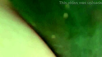 Mature Woman Spreads Legs Wide for Wet Cucumber Masturbation on Hairless Pussy