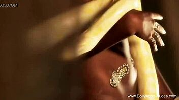 beautiful indian woman performs an arousing dance for the audience