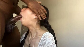 Petite Asian teen Eva Yi passionately deep throats a big black cock