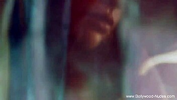 beautiful indian woman performs an arousing dance for the audience