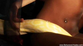 beautiful indian woman performs an arousing dance for the audience