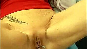Newly pierced blonde MILF shows off her shaved pussy and big boobs
