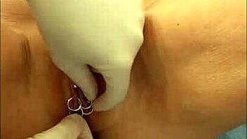Newly pierced blonde MILF shows off her shaved pussy and big boobs