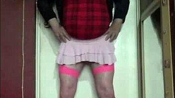 Bisexual crossdresser takes on a humiliating handjob