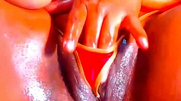 Teen's anal and vaginal pleasure with black dildo
