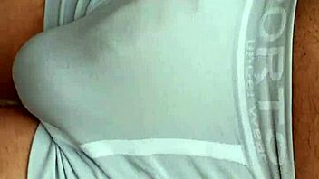 A public outdoor story where a man has a hardon in tight shorts, attracting attention