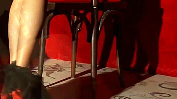 Brunette in roleplay undresses and performs striptease