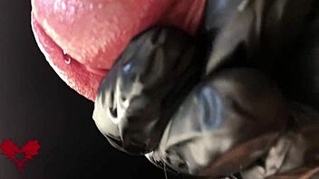 this is close up extreme second side view latex gloves detailled peehole and cumshot