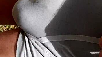 A public outdoor story where a man has a hardon in tight shorts, attracting attention