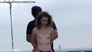 Young girl tied in public bondage in Berlin.