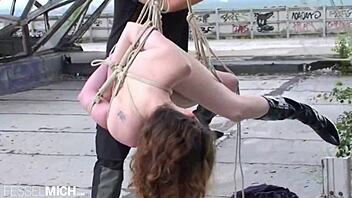 Young girl tied in public bondage in Berlin.