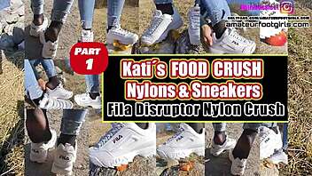 Foot fetish video features girl playing with sweaty Fila sneakers and nylons