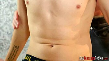 Oiled twink rides masseur's cock during massage.