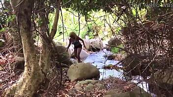 Nina relaxes by the riverside with Don