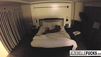 does jezebelle bond masturbate her big tits in the hotel room?
