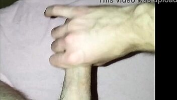 young guy at home massages his cock in solo masturbation session