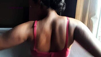 Indian wife teases with sensual strip show and clothes removal